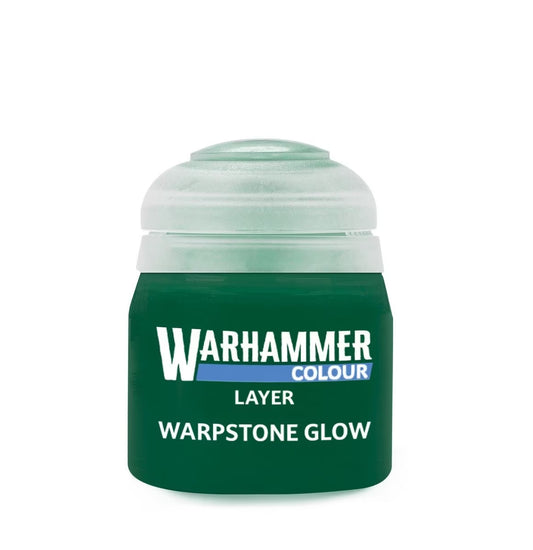 A jar of Warhammer Colour Layer paint in the shade Warpstone Glow, featuring a dark green body and a translucent light green cap on a white background.