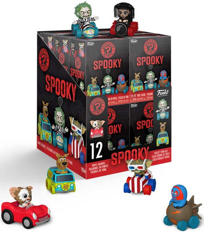 A display box of Funko Spooky blind bags with several small character figures and cars arranged in front on a white studio background.
