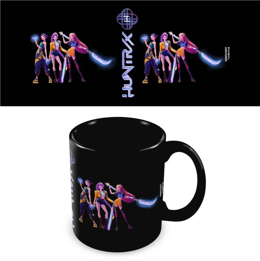 Black mug with colorful band illustration and 'Huntrax' logo on a white background