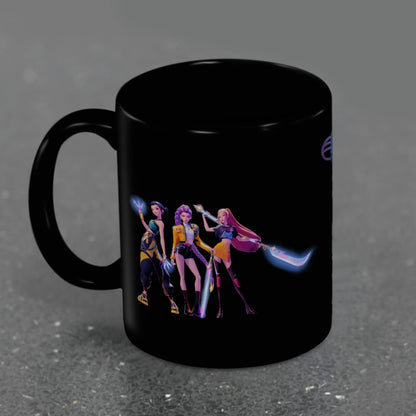Black mug with colorful character design on a dark gray background