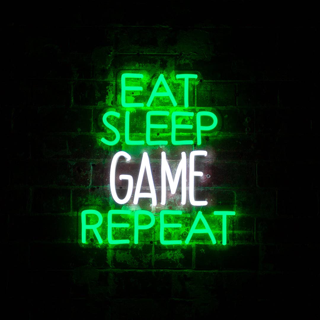 Neon sign with 'Eat Sleep Game Repeat' text on a dark background