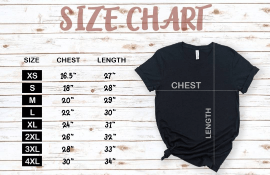 Black t-shirt with size chart on a wooden background