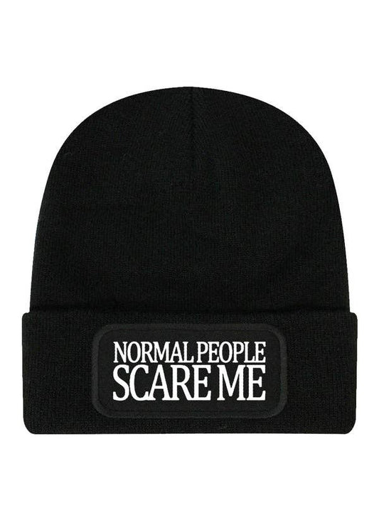 Black beanie with 'Normal People Scare Me' patch on a white background