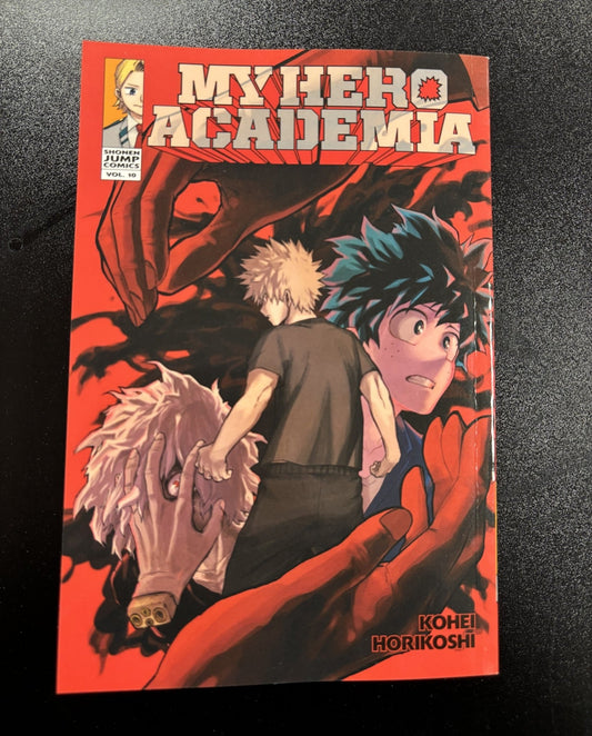 Comic book cover of 'My Hero Academia' with two characters and a red background.