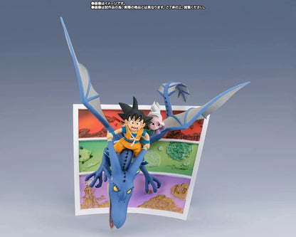 Dragon Ball Z figurine of Goku riding Blue Dragon, posed in front of a colorful landscape card on a gray gradient background.