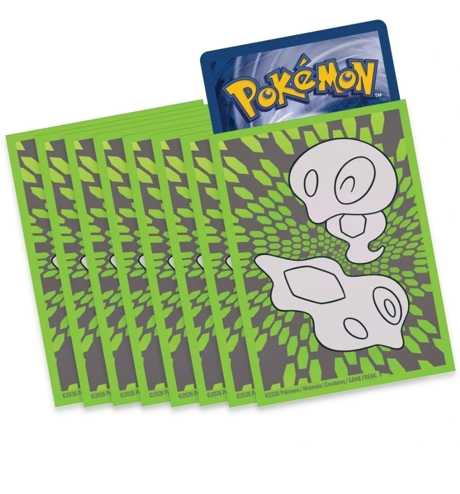 Pokémon trading card game packs with a green and gray patterned card featuring a ghost-like creature.