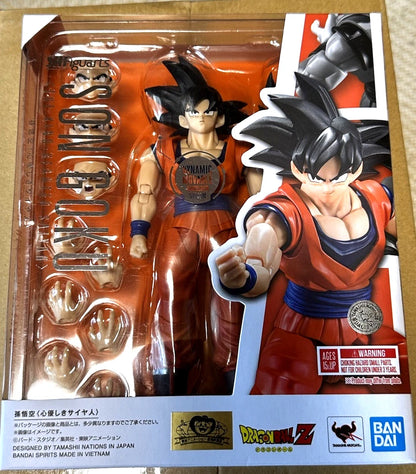 Dragon Ball Z Goku action figure in its original window box packaging, featuring the figure, interchangeable hands, and character art on the box front.