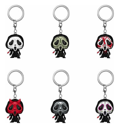 Six Ghostface keychains with silver metal keyrings, shown in a 2x3 grid on a white background. Each keychain has a different reaper face design: white with black, green, red-and-white, red, black-and-white, and black-and-purple.
